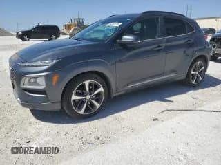 ✅ 2018 Hyundai Kona Ultimate • VIN: KM8K53A59JU105843 • Лот: 49783235. Опубликован ранее на Copart с пробегом 144 126 миль. Бесплатный доступ к архиву аукционных продаж из США и подробный отчёт об истории автомобиля на DreamBid. Изображение 1.