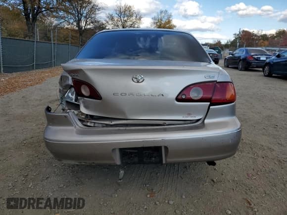 ✅ 2002 Toyota Corolla CE • VIN: 1NXBR12E72Z598558 • Lot: 82772345. Listed on Copart with 148,414 mi. Free auction sales archive from the USA and detailed vehicle history report at DreamBid. Image 6.