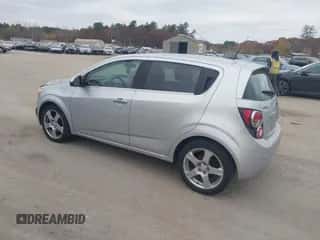 2014 Chevrolet Sonic LTZ with VIN 1G1JE6SB3E4226484, listed as a IAAI auction lot 43583999 with 114,708 mi miles and . Bid and sale history available at DreamBid. Image 3.