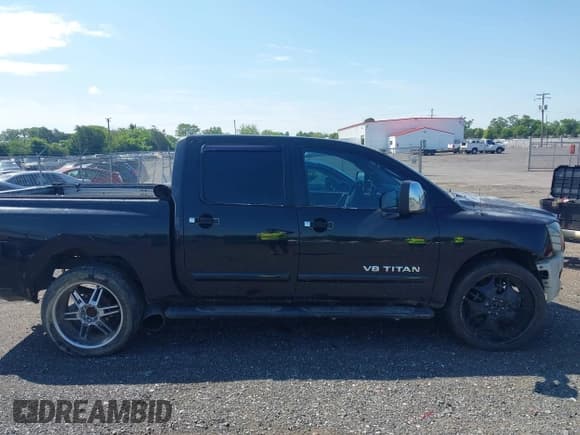 ✅ 2005 Nissan Titan LE • VIN: 1N6AA07B05N509859 • Lot: 42662424. Listed on IAAI with 252,000 mi. Free auction sales archive from the USA and detailed vehicle history report at DreamBid. Image 14.