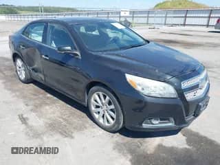 2013 Chevrolet Malibu LTZ z VIN 1G11H5SA4DF265399, wystawiony jako IAAI lot #43092399 z przebiegiem 250 000 mil mil oraz . Historia ofert i sprzedaży dostępna na DreamBid. Obrazek 1.