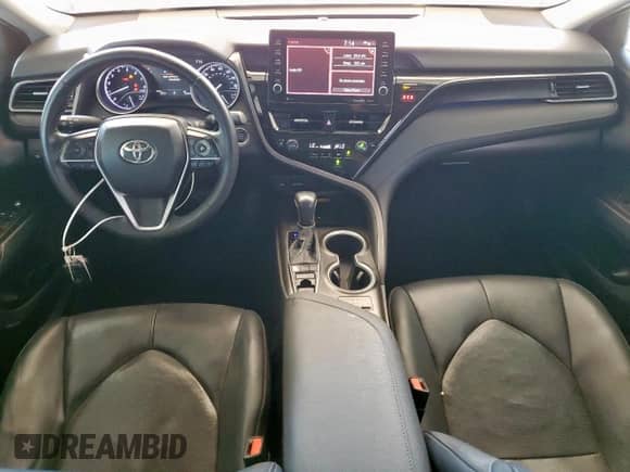 2022 Toyota Camry XLE с VIN 4T1F11AKXNU010625, выставлен на аукционе Copart как лот 67989715 с пробегом 83 429 миль миль и Списание • Salvage title. История ставок и продаж доступна на DreamBid. Изображение 8.