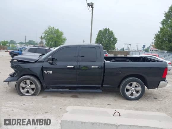2018 Ram 1500 SLT with VIN 1C6RR6GG9JS169241, listed as a IAAI auction lot 42498561 with 77,075 mi miles and . Bid and sale history available at DreamBid. Image 14.
