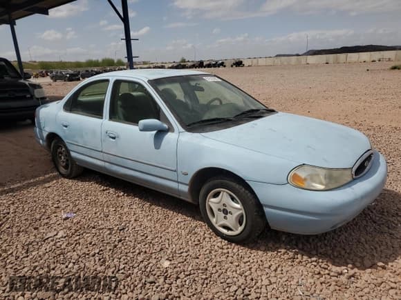✅ 1998 Ford Contour LX • VIN: 1FAFP66LXWK197384 • Lot: 51519385. Listed on Copart with 56,958 mi. Free auction sales archive from the USA and detailed vehicle history report at DreamBid. Image 4.