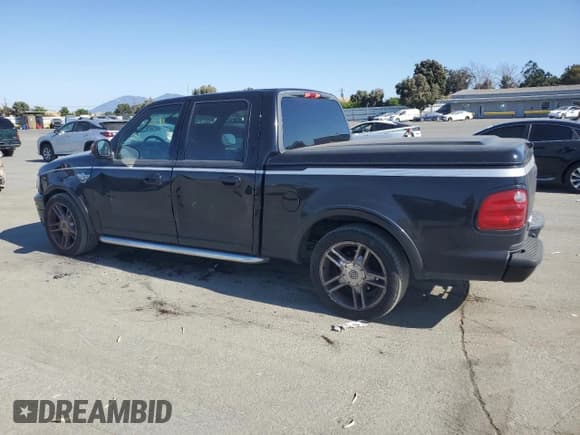 ✅ 2003 Ford F-150 Harley-Davidson • VIN: 1FTRW07373KC44985 • Lot: 58571585. Listed on Copart with 202,249 mi. Free auction sales archive from the USA and detailed vehicle history report at DreamBid. Image 2.
