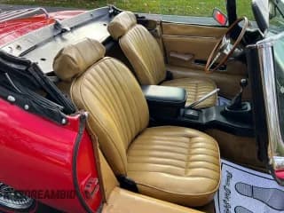 ✅ 1970 Jaguar E-Type • VIN: 1R12917 • Lot: 93436405. Wystawiony na Copart z przebiegiem 27 802 mil. Bezpłatny archiwum sprzedaży aukcyjnych z USA i szczegółowy raport historii pojazdu na DreamBid. Zdjęcie 5.