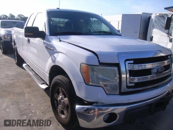 ✅ 2014 Ford F-150 XL • VIN: 1FTFX1EF2EKE57980 • Lot: 42197614. Listed on IAAI with 283,114 mi. Free auction sales archive from the USA and detailed vehicle history report at DreamBid. Image 1.