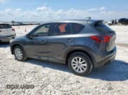 ✅ 2014 Mazda CX-5 Sport • VIN: JM3KE2BE5E0386119 • Lot: 68226855. Listed on Copart with 310,877 mi. Free auction sales archive from the USA and detailed vehicle history report at DreamBid. Image 2.