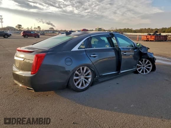 ✅ 2015 Cadillac XTS Luxury • VIN: 2G61M5S39F9203791 • Lot: 82331875. Wystawiony na Copart z przebiegiem 135 011 mil. Bezpłatny archiwum sprzedaży aukcyjnych z USA i szczegółowy raport historii pojazdu na DreamBid. Zdjęcie 3.