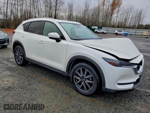 ✅ 2018 Mazda CX-5 Grand Touring • VIN: JM3KFBDM4J0337411 • Lot: 94065165. Listed on Copart with 51,618 mi. Free auction sales archive from the USA and detailed vehicle history report at DreamBid. Image 4.