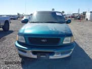 ✅ 1998 Ford F-150 • VIN: 1FTRX18L7WKA28205 • Лот: 42905121. Опубликован ранее на IAAI с пробегом 208 071 миль. Бесплатный доступ к архиву аукционных продаж из США и подробный отчёт об истории автомобиля на DreamBid. Изображение 12.