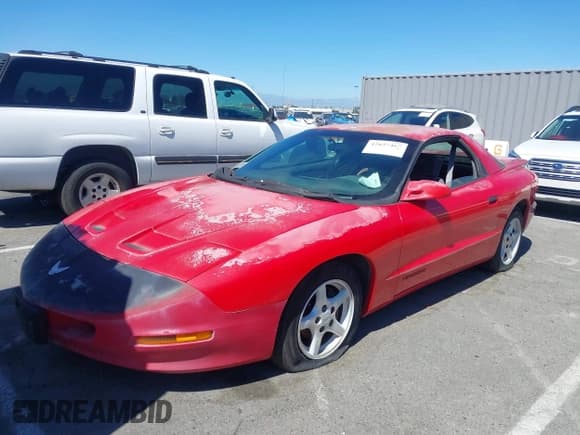 ✅ 1997 Pontiac Firebird Firebird • VIN: 2G2FS22K8V2226294 • Lot: 42827467. Listed on IAAI with 167,543 mi. Free auction sales archive from the USA and detailed vehicle history report at DreamBid. Image 2.