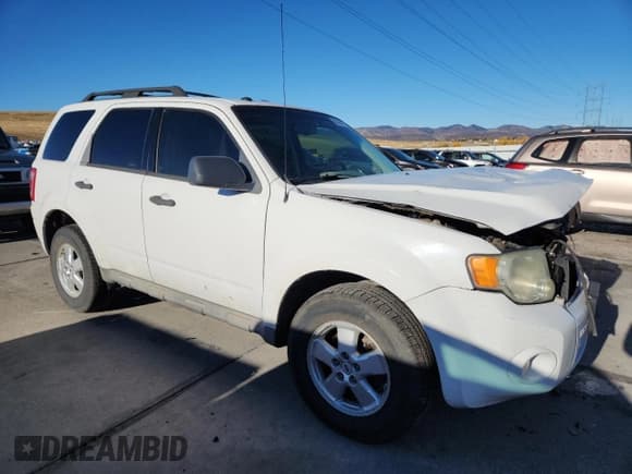✅ 2009 Ford Escape XLT • VIN: 1FMCU03769KB02796 • Lot: 85206785. Listed on Copart with 233,760 mi. Free auction sales archive from the USA and detailed vehicle history report at DreamBid. Image 4.
