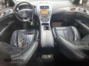 ✅ 2019 Lincoln MKZ Hybrid Reserve I • VIN: 3LN6L5LU1KR633800 • Лот: 81841795. Опубликован ранее на Copart с пробегом 182 043 миль. Бесплатный доступ к архиву аукционных продаж из США и подробный отчёт об истории автомобиля на DreamBid. Изображение 8.