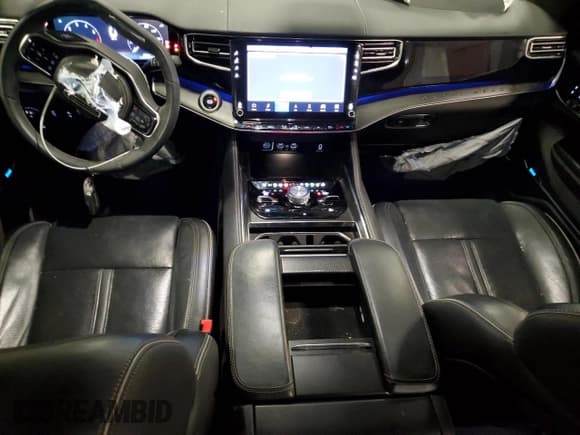 ✅ 2024 Jeep Grand Wagoneer Series II Obsidian • VIN: 1C4SJVFP1RS107244 • Lot: 91285045. Wystawiony na Copart z przebiegiem 50 880 mil. Bezpłatny archiwum sprzedaży aukcyjnych z USA i szczegółowy raport historii pojazdu na DreamBid. Zdjęcie 8.