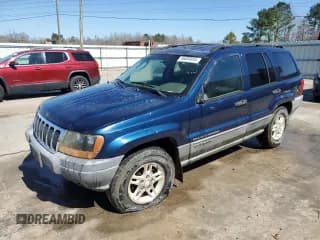 ✅ 2002 Jeep Grand Cherokee • VIN: 1J8GX48S62C129913 • Lot: 46600895. Listed on Copart with 153,779 mi. Free auction sales archive from the USA and detailed vehicle history report at DreamBid. Image 1.