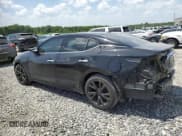 ✅ 2017 Nissan Maxima Platinum • VIN: 1N4AA6AP1HC452846 • Lot: 65389015. Listed on Copart with 127,946 mi. Free auction sales archive from the USA and detailed vehicle history report at DreamBid. Image 2.