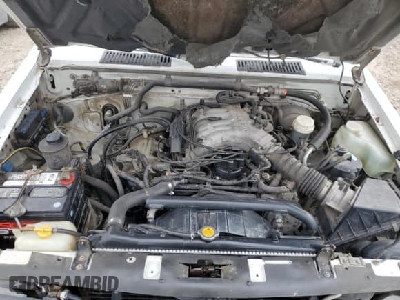 ✅ 1990 Nissan Pathfinder LE • VIN: JN8HD17Y8LW218248 • Lot: 47497965. Listed on Copart with 265,433 mi. Free auction sales archive from the USA and detailed vehicle history report at DreamBid. Image 11.