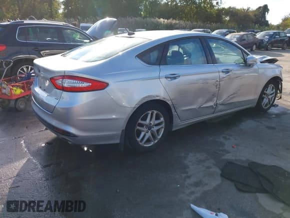 ✅ 2014 Ford Fusion SE • VIN: 3FA6P0H7XER146801 • Lot: 43416256. Listed on IAAI with 90,675 mi. Free auction sales archive from the USA and detailed vehicle history report at DreamBid. Image 4.