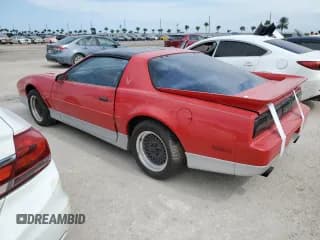 ✅ 1987 Pontiac Firebird • VIN: 1G2FW21F2HL234386 • Lot: 76476474. Listed on Copart with 35,593 mi. Free auction sales archive from the USA and detailed vehicle history report at DreamBid. Image 2.