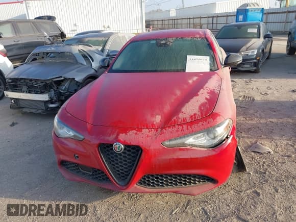 ✅ 2021 Alfa Romeo Giulia • VIN: ZARFAMAN1M7649060 • Lot: 41452670. Listed on IAAI with 47,259 mi. Free auction sales archive from the USA and detailed vehicle history report at DreamBid. Image 12.