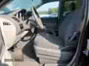 2009 Dodge Grand Caravan SE with VIN 2D8HN44E49R507991, listed as a Copart auction lot 81677245 with 182,384 mi miles and Salvage title. Bid and sale history available at DreamBid. Image 7.