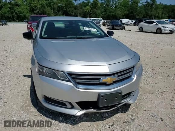 ✅ 2015 Chevrolet Impala LS • VIN: 1G11Z5SL3FU105320 • Lot: 71305375. Listed on Copart with 143,599 mi. Free auction sales archive from the USA and detailed vehicle history report at DreamBid. Image 14.