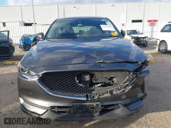 ✅ 2018 Mazda CX-5 Touring • VIN: JM3KFACM8J0375736 • Lot: 43673038. Wystawiony na IAAI z przebiegiem 111 478 mil. Bezpłatny archiwum sprzedaży aukcyjnych z USA i szczegółowy raport historii pojazdu na DreamBid. Zdjęcie 13.