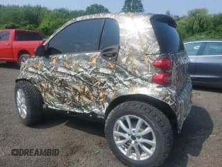 ✅ 2014 Smart fortwo Passion • VIN: WMEEJ9AA9EK737869 • Lot: 60492295. Wystawiony na Copart z przebiegiem 32 226 mil. Bezpłatny archiwum sprzedaży aukcyjnych z USA i szczegółowy raport historii pojazdu na DreamBid. Zdjęcie 2.