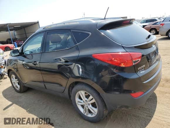 2011 Hyundai Tucson GLS z VIN KM8JUCAC9BU156922, wystawiony jako Copart lot #64274714 z przebiegiem 101 631 mil mil oraz Szkoda całkowita • Salvage title. Historia ofert i sprzedaży dostępna na DreamBid. Obrazek 2.