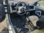 ✅ 2014 Smart fortwo Pure • VIN: WMEEJ3BA8EK733193 • Lot: 62123245. Listed on Copart with Not provided. Free auction sales archive from the USA and detailed vehicle history report at DreamBid. Image 8.