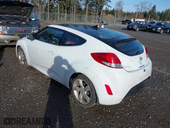 ✅ 2014 Hyundai Veloster • VIN: KMHTC6AD9EU185928 • Lot: 41720927. Wystawiony na IAAI z przebiegiem 94 023 mil. Bezpłatny archiwum sprzedaży aukcyjnych z USA i szczegółowy raport historii pojazdu na DreamBid. Zdjęcie 3.