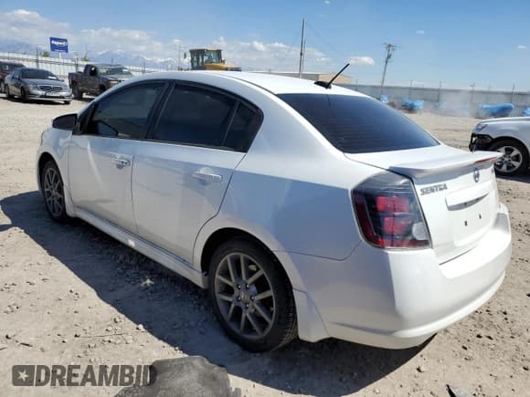 ✅ 2012 Nissan Sentra SE-R • VIN: 3N1BB6AP3CL717701 • Лот: 54789815. Опубликован ранее на Copart с пробегом 144 952 миль. Бесплатный доступ к архиву аукционных продаж из США и подробный отчёт об истории автомобиля на DreamBid. Изображение 2.