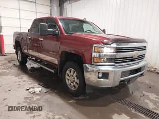 ✅ 2015 Chevrolet Silverado 2500HD LT • VIN: 1GC1KVE87FF113492 • Лот: 41556754. Опубликован ранее на IAAI с пробегом 200 870 миль. Бесплатный доступ к архиву аукционных продаж из США и подробный отчёт об истории автомобиля на DreamBid. Изображение 1.