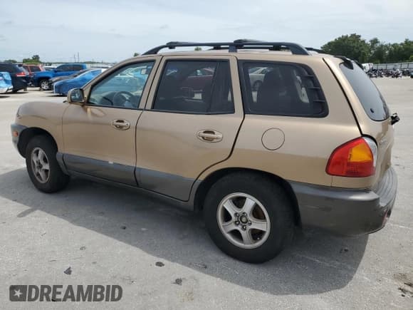 ✅ 2004 Hyundai Santa Fe GLS • VIN: KM8SC13E84U576488 • Lot: 63513805. Listed on Copart with 113,913 mi. Free auction sales archive from the USA and detailed vehicle history report at DreamBid. Image 2.