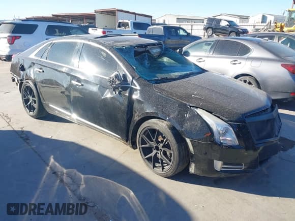✅ 2014 Cadillac XTS Luxury • VIN: 2G61M5S35E9168570 • Lot: 42495684. Listed on IAAI with 207,831 mi. Free auction sales archive from the USA and detailed vehicle history report at DreamBid. Image 1.