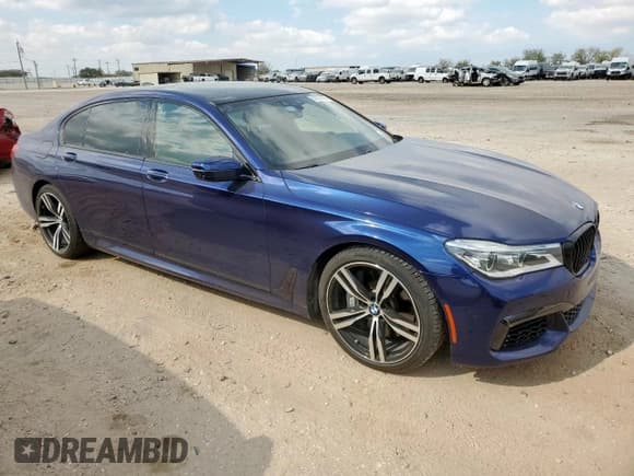 ✅ 2016 BMW 7 Series 750i • VIN: WBA7F0C53GGL99778 • Lot: 92937955. Listed on Copart with 105,323 mi. Free auction sales archive from the USA and detailed vehicle history report at DreamBid. Image 4.