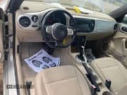 ✅ 2013 Volkswagen Beetle 2.5L • VIN: 3VW5X7AT2DM825928 • Lot: 66500855. Listed on Copart with 48,795 mi. Free auction sales archive from the USA and detailed vehicle history report at DreamBid. Image 9.