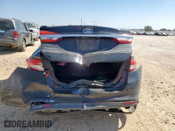 ✅ 2017 Ford Fusion Hybrid SE • VIN: 3FA6P0LUXHR285327 • Lot: 86331345. Wystawiony na Copart z przebiegiem 183 740 mil. Bezpłatny archiwum sprzedaży aukcyjnych z USA i szczegółowy raport historii pojazdu na DreamBid. Zdjęcie 6.