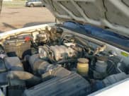 ✅ 2000 Isuzu Rodeo S • VIN: 4S2CK58W1Y4323057 • Lot: 43357739. Listed on IAAI with 147,414 mi. Free auction sales archive from the USA and detailed vehicle history report at DreamBid. Image 19.