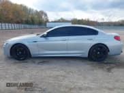 ✅ 2015 BMW 6 Series 650i • VIN: WBA6B2C5XFD799355 • Lot: 43664300. Listed on IAAI with 125,050 mi. Free auction sales archive from the USA and detailed vehicle history report at DreamBid. Image 14.