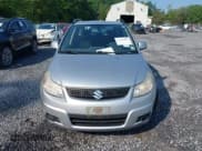 ✅ 2012 Suzuki SX4 Crossover • VIN: JS2YB5A3XC6300736 • Lot: 42428403. Listed on IAAI with 153,499 mi. Free auction sales archive from the USA and detailed vehicle history report at DreamBid. Image 6.