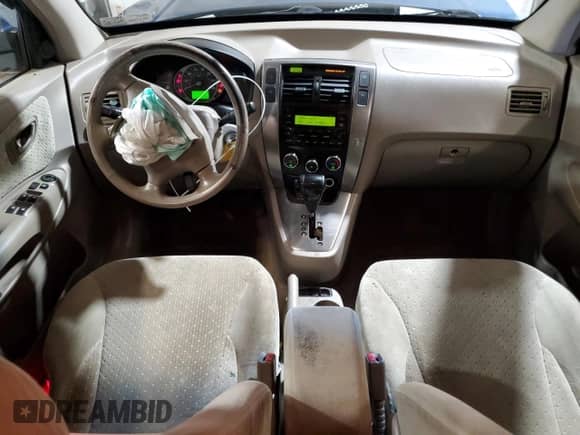 2005 Hyundai Tucson GLS z VIN KM8JN12D35U072088, wystawiony jako Copart lot #65343044 z przebiegiem 191 437 mil mil oraz Szkoda całkowita • Salvage title. Historia ofert i sprzedaży dostępna na DreamBid. Obrazek 8.