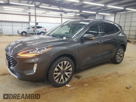 ✅ 2020 Ford Escape Titanium • VIN: 1FMCU9J91LUA25131 • Lot: 91041895. Listed on Copart with 102,819 mi. Free auction sales archive from the USA and detailed vehicle history report at DreamBid. Image 1.