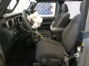 ✅ 2023 Jeep Wrangler Sport S • VIN: 1C4HJXAG9PW677785 • Lot: 70341275. Listed on Copart with 32,130 mi. Free auction sales archive from the USA and detailed vehicle history report at DreamBid. Image 7.