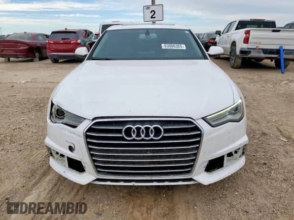 ✅ 2018 Audi A6 Premium • VIN: WAUC8AFC2JN017266 • Lot: 63006365. Wystawiony na Copart z przebiegiem 137 556 mil. Bezpłatny archiwum sprzedaży aukcyjnych z USA i szczegółowy raport historii pojazdu na DreamBid. Zdjęcie 5.