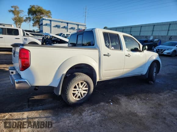 ✅ 2014 Nissan Frontier SL • VIN: 1N6AD0ERXEN770164 • Лот: 89867255. Опубликован ранее на Copart с пробегом 96 445 миль. Бесплатный доступ к архиву аукционных продаж из США и подробный отчёт об истории автомобиля на DreamBid. Изображение 3.