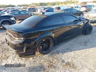 ✅ 2022 Dodge Charger SRT Hellcat Widebody • VIN: 2C3CDXL97NH121510 • Lot: 43478561. Wystawiony na IAAI z przebiegiem 42 368 mil. Bezpłatny archiwum sprzedaży aukcyjnych z USA i szczegółowy raport historii pojazdu na DreamBid. Zdjęcie 4.