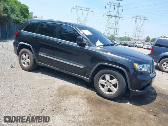 ✅ 2011 Jeep Grand Cherokee Laredo • VIN: 1J4RR4GG7BC596730 • Lot: 42473954. Listed on IAAI with 163,674 mi. Free auction sales archive from the USA and detailed vehicle history report at DreamBid. Image 1.