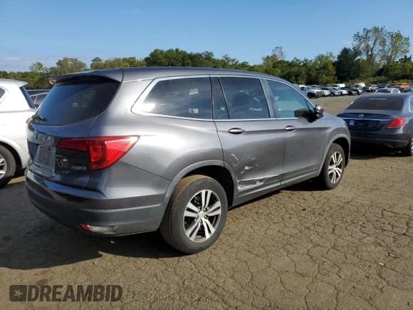 ✅ 2017 Honda Pilot EX-L • VIN: 5FNYF6H60HB103137 • Lot: 81610055. Listed on Copart with 116,919 mi. Free auction sales archive from the USA and detailed vehicle history report at DreamBid. Image 3.